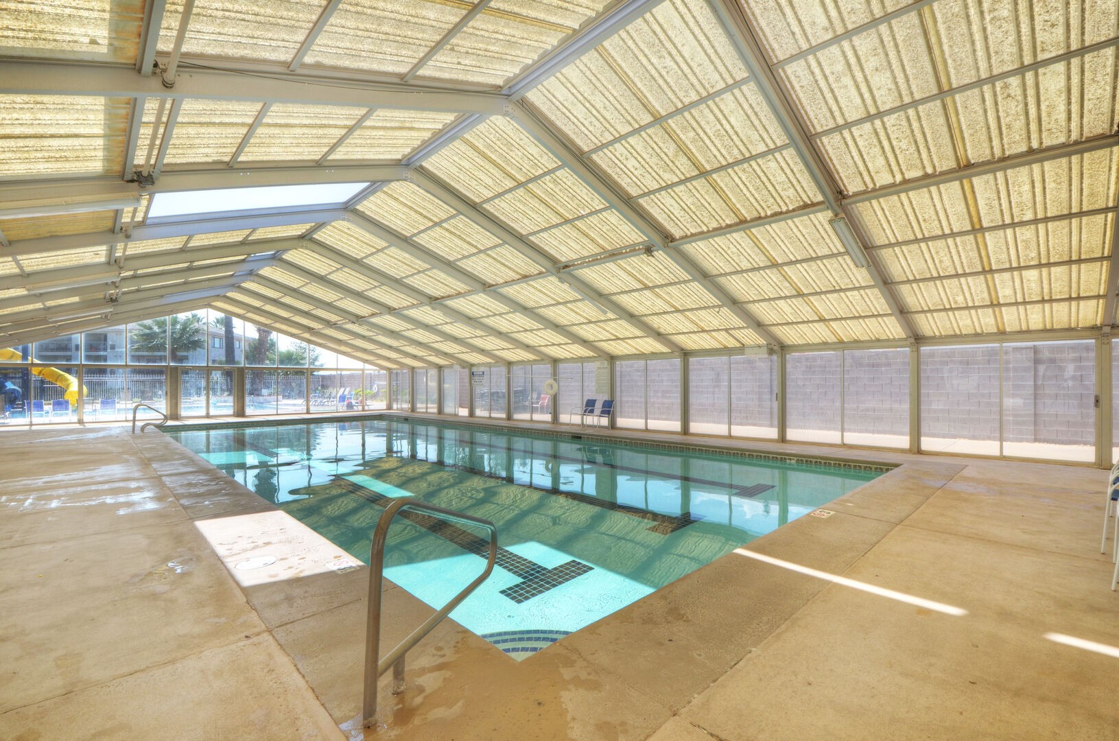 Heated pool in covered area.