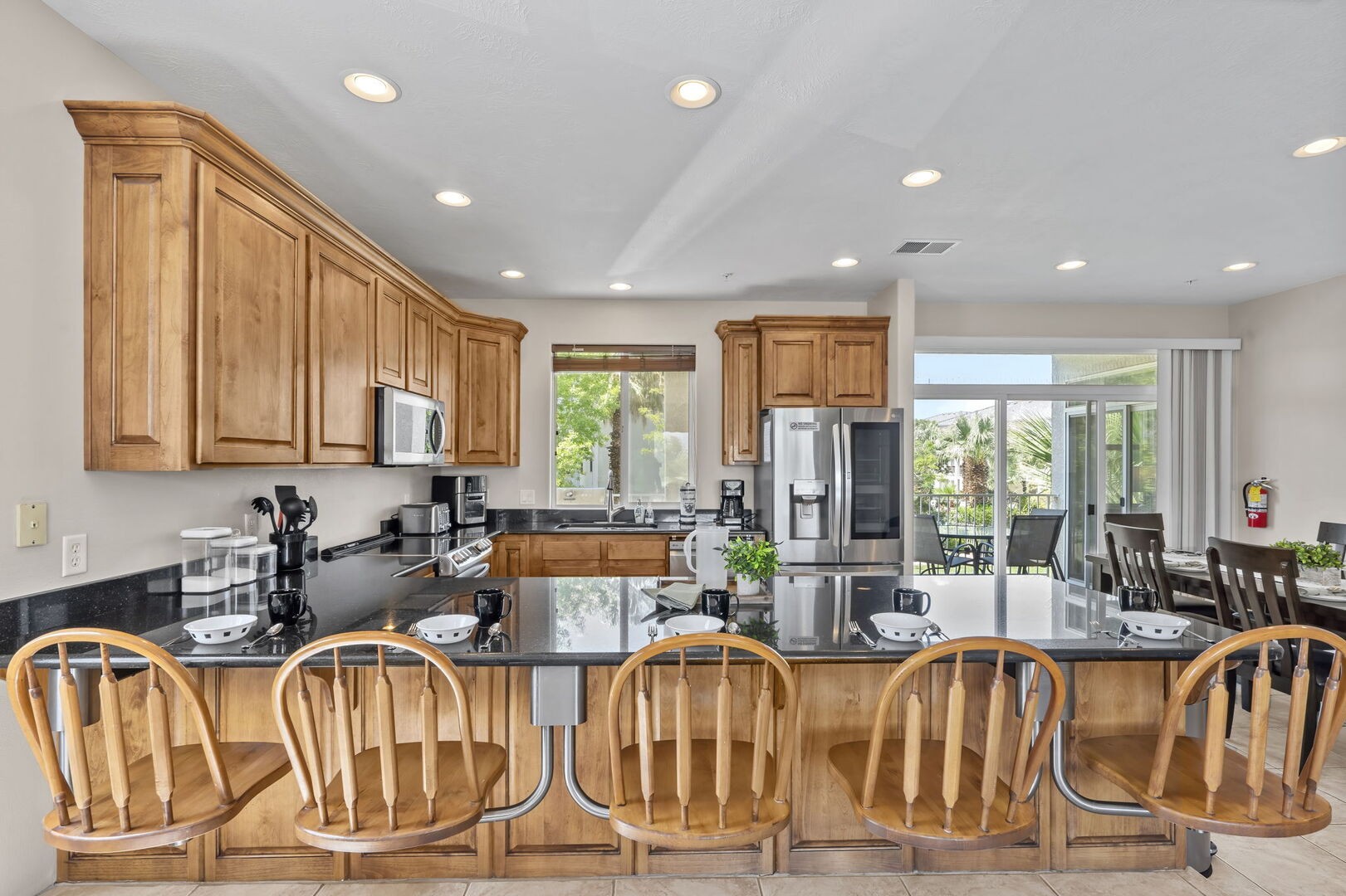 Kitchen showing patio access.